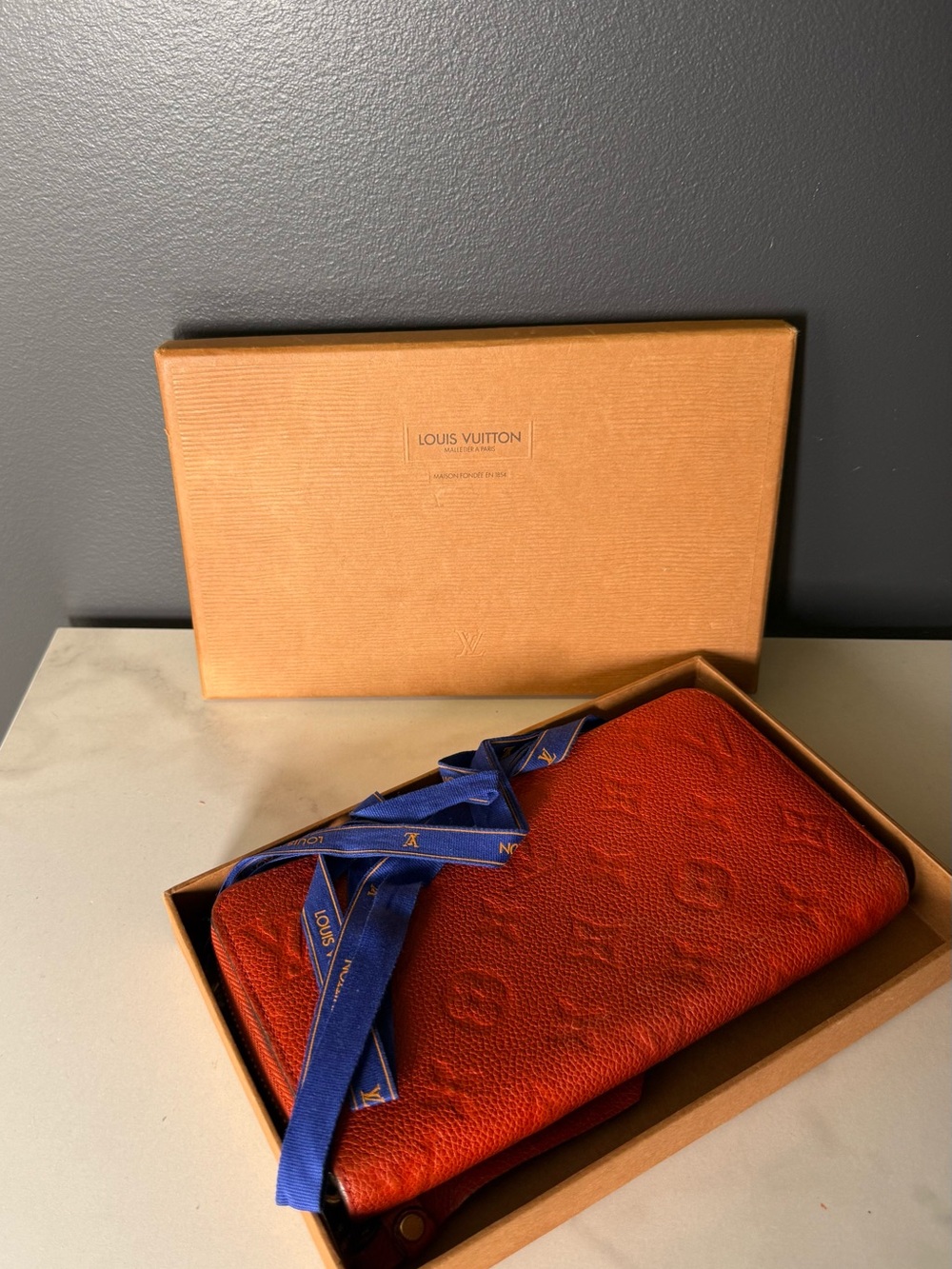 Louis Vuitton Red Embossed Monogram Zippered Wallet